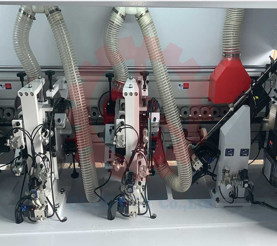 Cụm xén trên dưới máy dán cạnh thẳng nghiêng option keo pur | Quốc Duy